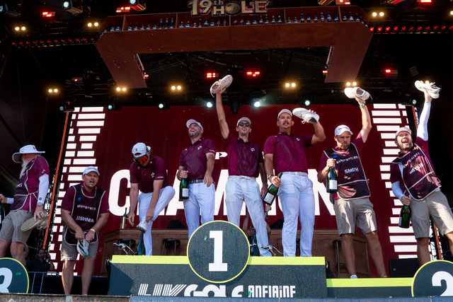 First place team champions, Captain Cameron Smith, Elvis Smylie, Lucas Herbert and Marc Leishman of Ripper GC celebrate with a shoey during the trophy ceremony during the final round of the LIV Golf Adelaide at Grange Golf Club on Sunday, February 15, 2026 in Adelaide, Australia. (Photo by Mateo Villalba/LIV Golf)